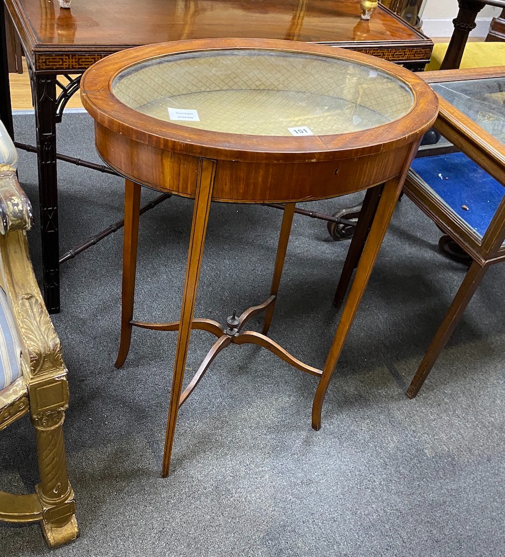 An Edwardian inlaid satinwood oval bijouterie table, width 58cm, depth 38cm, height 76cm
